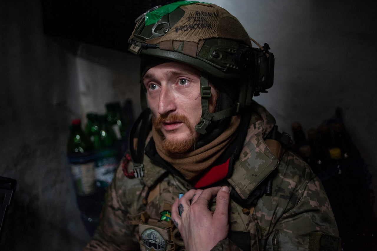 Portrait of a servicemember indoors.