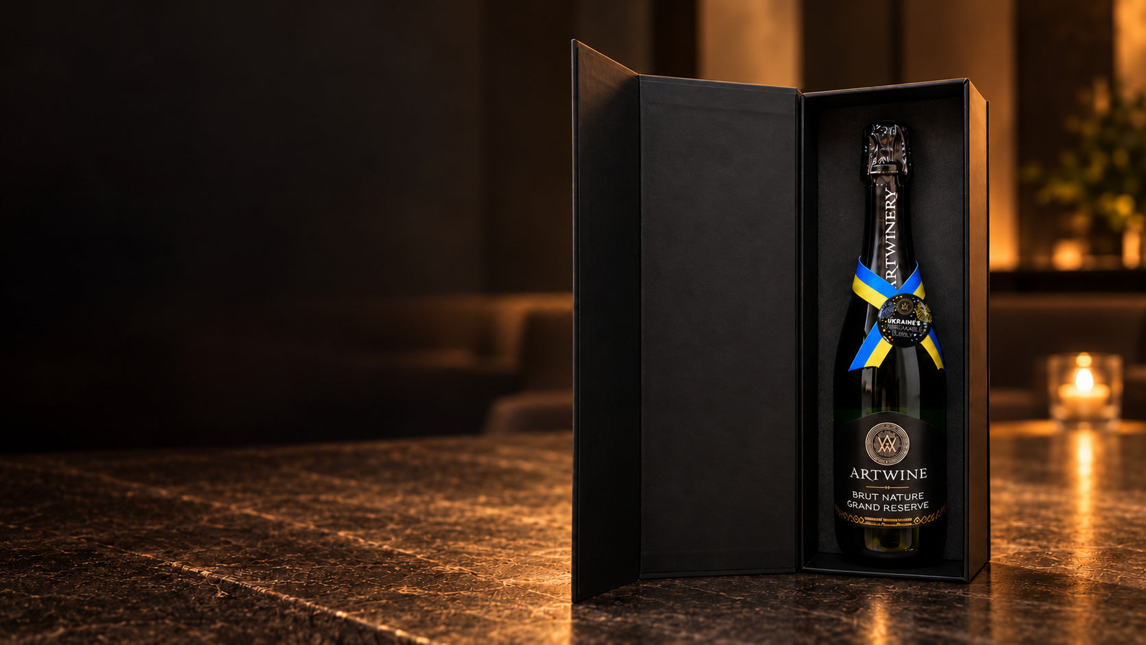 The Collector’s Edition presentation box with Artwine Grand Reserve and its blue-and-yellow ribbon